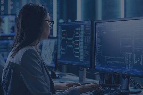 Woman experiencing Alert Fatigue while at her workstation