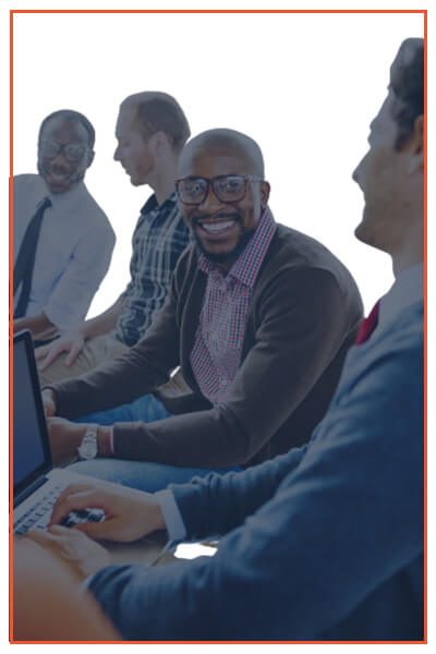 A diverse team of intelligence experts discussing adversary attribution