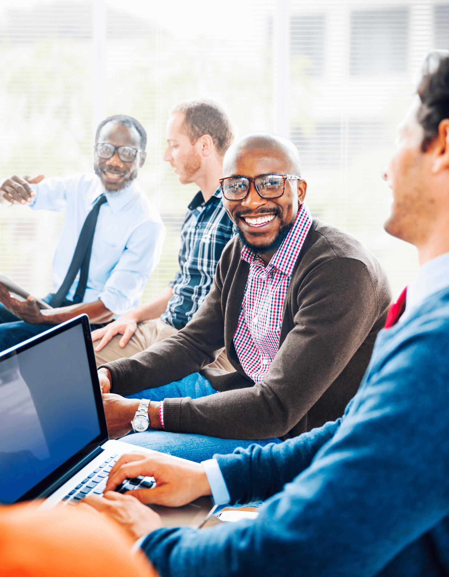 Diverse Team Laughing and Working